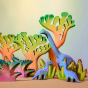Bumbu blue Brontosaurus dinosaur toys surrounded by big and small dino trees, fern bushes and banana bushes