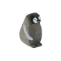Bumbu childrens hand carved wooden penguin chick toy on a white background