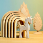 Bumbu Natural Wooden Stacking Arches. The arches are paired with trees and a unicorn.