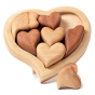Bumbu eco-friendly wooden heart puzzle set stood up on a white background