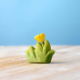 Bumbu plastic-free wooden grass and flower toy on a wooden worktop
