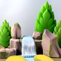 Bumbu Wooden Waterfall. The toy is part of a water scene with rocks and trees.