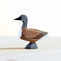 Bumbu eco-friendly wooden wild goose children's toy figure stood on a light wooden background