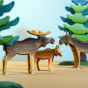 Bumbu Wooden Moose family pictured with bumbu trees in the background