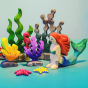 Bumbu wooden Giant Kelp toy posed in an ocean play scene with the Bumbu wooden mermaid toy.