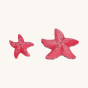 Bumbu Handmade Wooden Red Starfish Set. Beautifully hand painted star fish in light red with light pink and purple spots, on a cream background