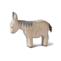 Side view of the Bumbu plastic free handmade toy donkey stood on a white background
