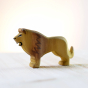 Bumbu eco-friendly wooden lion toy on a wooden surface