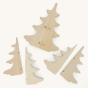 Pieces of the Bumbu natural wooden pine tree toy laid out on a beige background