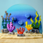 Bumbu seaweed sugar kelp wooden toy in an aquatic ocean play scene along with other Bumbu ocean toys.