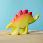 Bumbu wooden Stegosaurus dinosaur figure with yellow body and red back scales