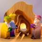 The Bumbu Baby Jesus and Crib surrounded by the Three Magi with a wooden cave in the background