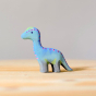 Bumbu Baby Brontosaurus pictured on a wooden surface 