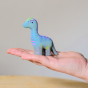Bumbu Baby Brontosaurus pictured in an adults hand