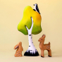 A Bumbu Wooden Deer and Rabbit stand necxt to the Bumbu Wooden Birch Tree, with a Miniature Bumbu Wood Pecker sitting on the top of the tree. The tree and figures are displayed on a light yellow background