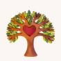 Bumbu Wooden Heart Tree. A beautifully crafted Wooden Tree with light brown branches, light and dark green leaves, with a removable wooden red heart in the center. The tree is displayed on a cream background