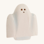 Bumbu hand carved Wooden Ghost toy, with small holes for eyes and a white and light blue, sheet-like body on a cream background