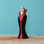 Bumbu Wooden Halloween Handmade Vampire Toy on a wooden table with a light blue back ground