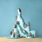 The Bumbu Icy Cliffs is a set of 5 handmade wooden blocks that stack together to make an icy mountain scene. With a family of wooden penguins arranged on the cliffs.