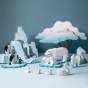 A snowy polar play scene using the wooden Bumbu Icy Cliffs, Polar bear family, penguin family and winter maple tree.