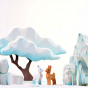 A snowy play scene using the wooden Bumbu Icy Cliffs, wooden deer and winter maple tree.