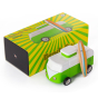 Candylab kids green wooden campervan with a magnetic surfboard, on a white background next to its box