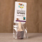 Cocoa Loco organic Fairtrade dark chocolate and praline hot chocolate spoon on a wooden table