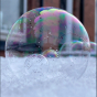 Close up of a Dr Zigs frozen bubble in some snow
