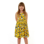 Girl stood on a white background wearing the DUNS Sweden organic cotton sleeveless gather skirt dress in the yellow puffin print