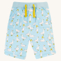 Frugi Children's Organic Cotton Aiden Printed Shorts - Splish Splash Ducks. Adorable Splish Splash Ducks print, these shorts have two pockets on the front and a stretchy rib waistband with drawcord for an extra comfortable and great fit, on a cream backgr