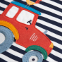 Tractor and material detail on the Frugi Bobby Applique Top - Indigo Stripe / Tractor.