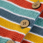 Button and material detail on the Frugi Bright As A Button Cardigan - Rainbow.