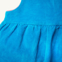 Pleated waist detail on the Frugi Caeli Cord Dress - Tobermory Teal / Unicorn.