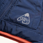 Frugi Reversible Toasty Trail Jacket - Birds of Prey / Indigo. Material and logo detail on the Indigo jacket.