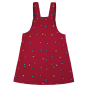 Back of the childrens Frugi eco-friendly cotton cord dungaree dress on a white background