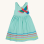 Frugi Organic Phebe Party Dress - Spring Mint / Macaw. A sleeveless, soft and lightweight organic cotton dobby dress in a gorgeous light mint green colour, with a bright Macaw parrot applique on the front. On a cream background