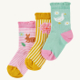 Frugi Freya Frilled Socks 3-Pack - Ducks. Made from GOTS Organic Cotton, these cheerful, frilled socks come in pink and white stripe with a bunny, Yellow and white stripe with a flower, and mint green with a duck and white flowers, on a cream background