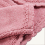 Cuff and hem detail on the Frugi Amy Bolero Cardigan - Pink Marl on a plain background.