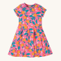 Frugi Organic Summer Skater Dress - Orange Blossom. A beautiful pink, short sleeve, skater dress with an all over orange blossom print and twirly bottom half, on a cream background
