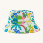 A closer look at the colourful jungle print on the Frugi Organic Rally Reversible Hat - Jaguar Jungle / Seersucker, on a cream background