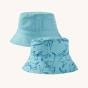Frugi Children's Organic Cotton Rocky Reversible Hat - Stingray / Jawsome. A fun, reversible sun hat in light blue. On one side of the hat are beautiful shark prints, and the reversible side is plain with a small pocket/pouch with a small Frugi logo label
