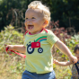 Child wearing the Frugi Bobster Applique T-Shirt Stripe Tractor