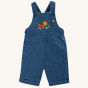 Frugi Organic Carnkie Chambray Denim Dungarees - Tractor. Chambray design dungarees with a tractor embroidered patch on the pocket. Made from soft organic cotton, with adjustable popper fastenings on the straps and an elasticated waist. On a cream backgro