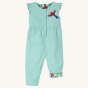 The plain side of the all-in-one with parrot applique of the Frugi Children's Organic Cotton Etta Reversible Playsuit - Tropical Birds / Spring Dobby. A beautiful reversible play-suit, filled with colourful tropical birds and flowers on one side, and a pl