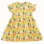 Frugi Dara Baby Body Dress with a yellow Rainbow Sprinkles design pictured on a plain background