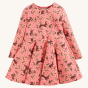 frugi winter tales sofia skater dress is a pink organic cotton jersey dress for babies and toddlers with a beautiful  all-over print featuring bunnies, mushrooms and leaves