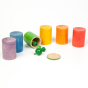 Grapat 6 Wooden Toy Rainbow Cups with lids on, lined up in rainbow colour order with green tipped over holding green bells. For colour matching, sorting, stacking and holding treasures. White background. 