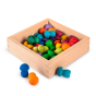 Grapat plastic-free wooden toy storage box filled with rainbow mandala toy pieces on a white background