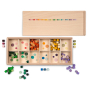 The Grapat Mis & Match play set, includes a wooden storage board with colourful dots, and small colourful cubes in various colors. The lid of the box has small painted dots in various colours and is on a white background