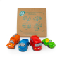 Green Rubber Toys mini vehicles set in front of its recyclable cardboard box packaging on a white background